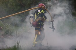 Snoeihout in brand gestoken in park Amsterdam